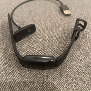 Fitbit. Worn 1x by my son